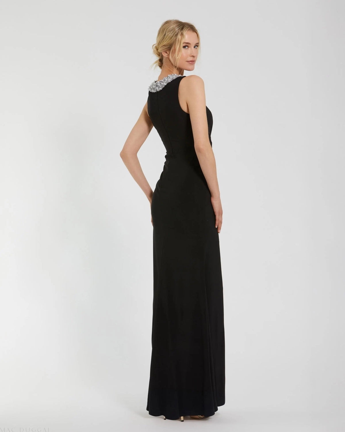Black Jersey Sleeveless Beaded Neck Gown With Twist