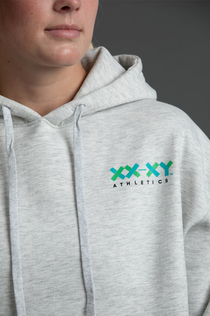 Gray hoodie with 'XXXY Athletics' logo on a dark background || Light Heather Gray